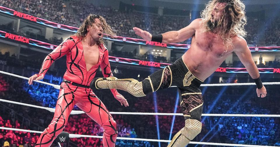 Featured image for "Intense Showdown: Rollins vs. Nakamura for World Heavyweight Title at WWE Payback 2023"