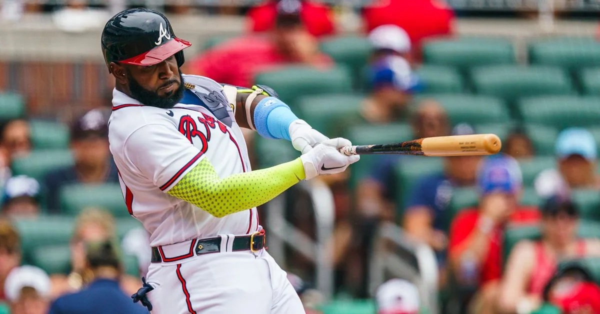 Braves' Ozuna leads lineup to victory over Phillies in extra innings.