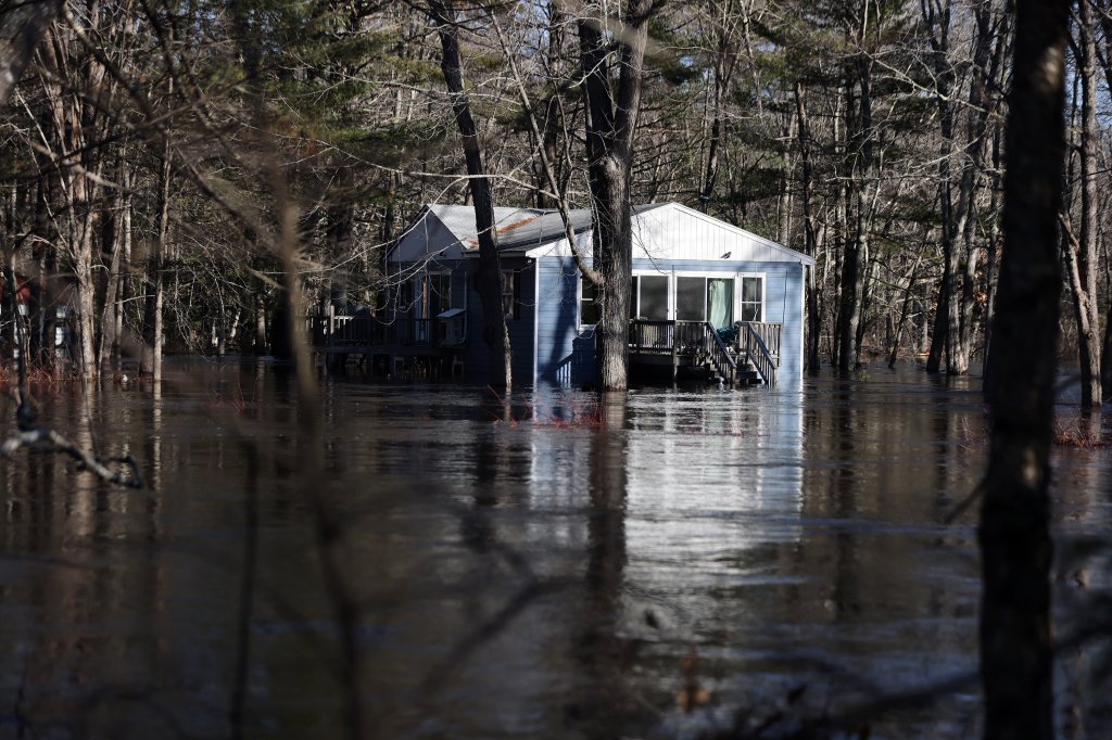Maine Faces Dual Crisis: Flooding and Power Outages