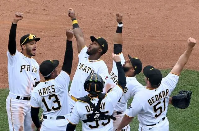 "Pirates Sweep Reds and Claim 1st Place in MLB Standings"