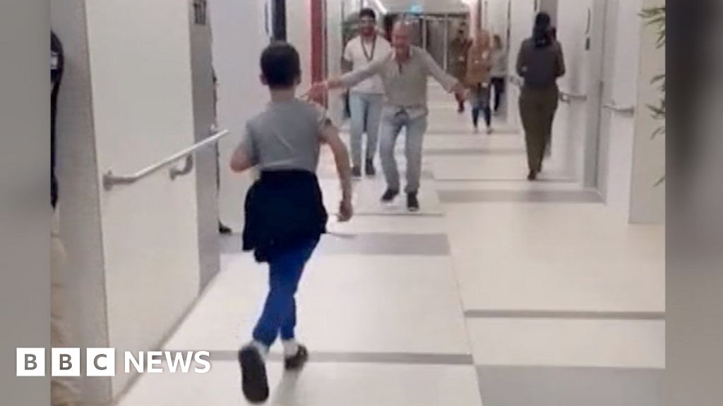 Heartwarming Reunion: Israeli Boy Freed from Hostage Ordeal Embraces Father