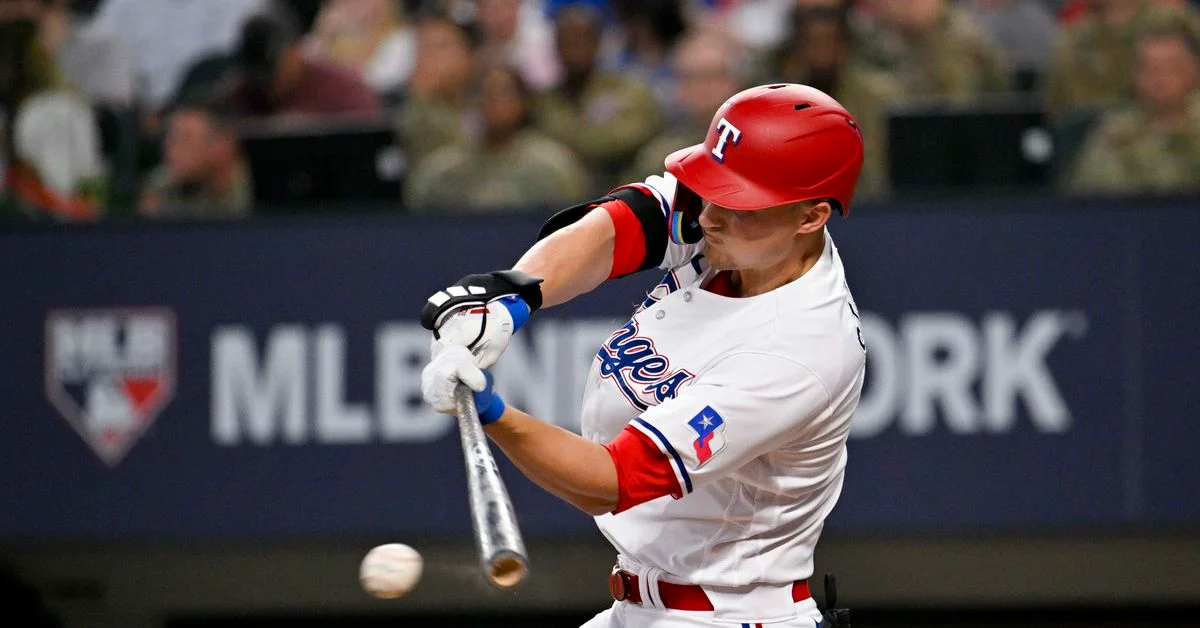Texas Rangers dominate Colorado Rockies in series opener.