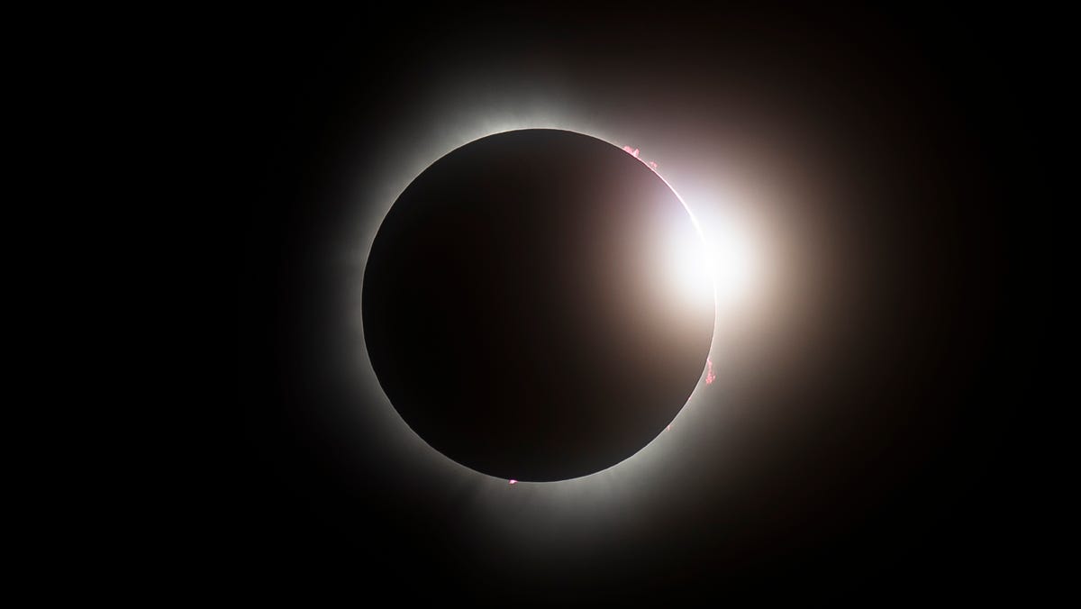 Featured image for "Capturing the Solar Eclipse: Detroit News Photographers' Perspective"