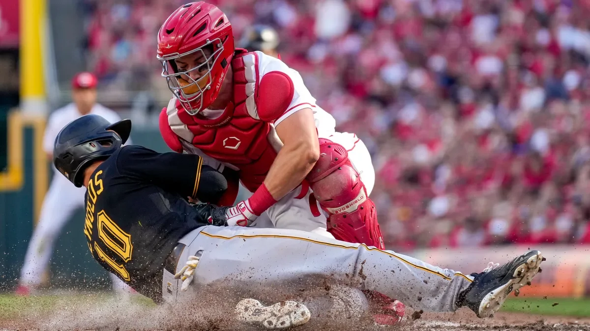 "Pirates rally past Reds on Opening Day despite bullpen struggles"