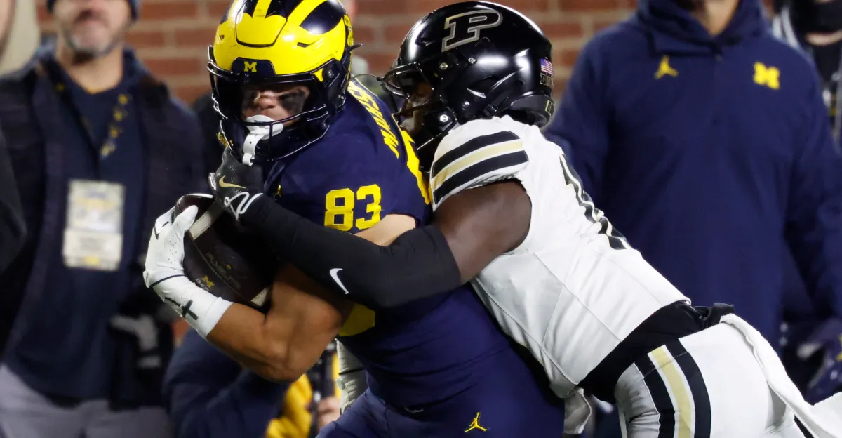 Featured image for Michigan Football Secures Narrow Victory Over Purdue Amid Player Injuries and Challenges