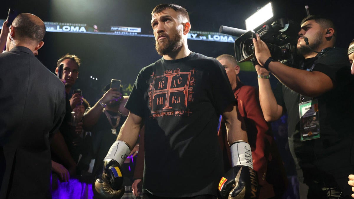 Featured image for Devin Haney narrowly defeats Vasiliy Lomachenko in highly anticipated boxing match.