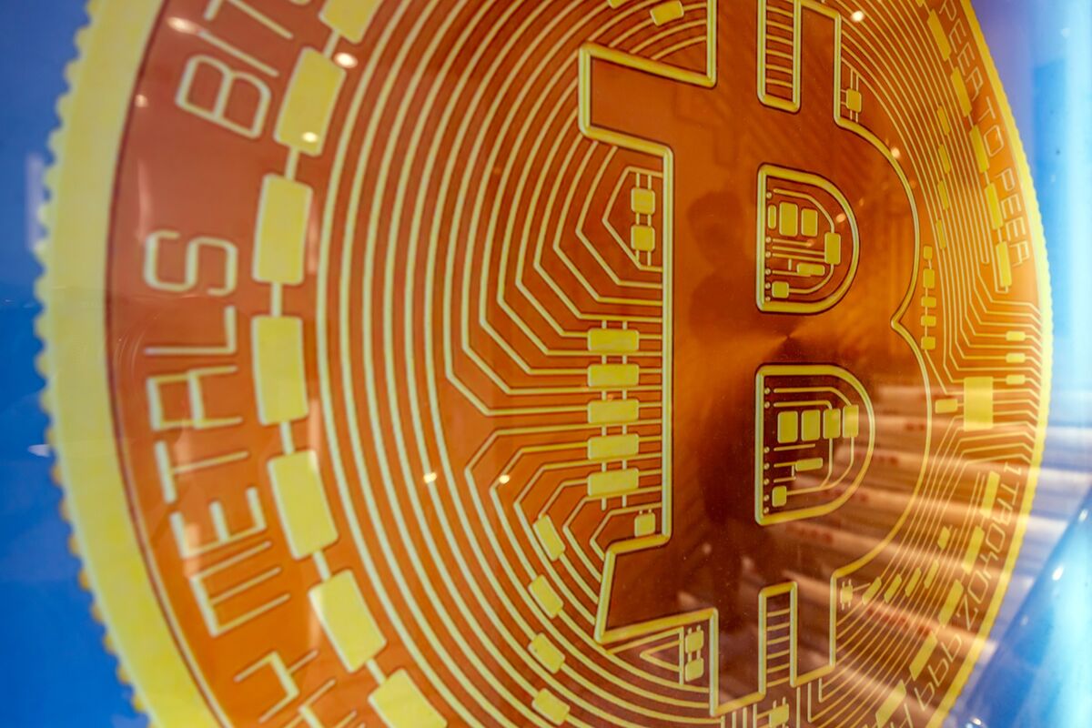 Bitcoin Dips Below $100K Amid Market Turmoil