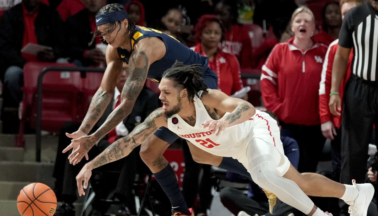 "Style Clash: BYU vs Houston in College Basketball Showdown"