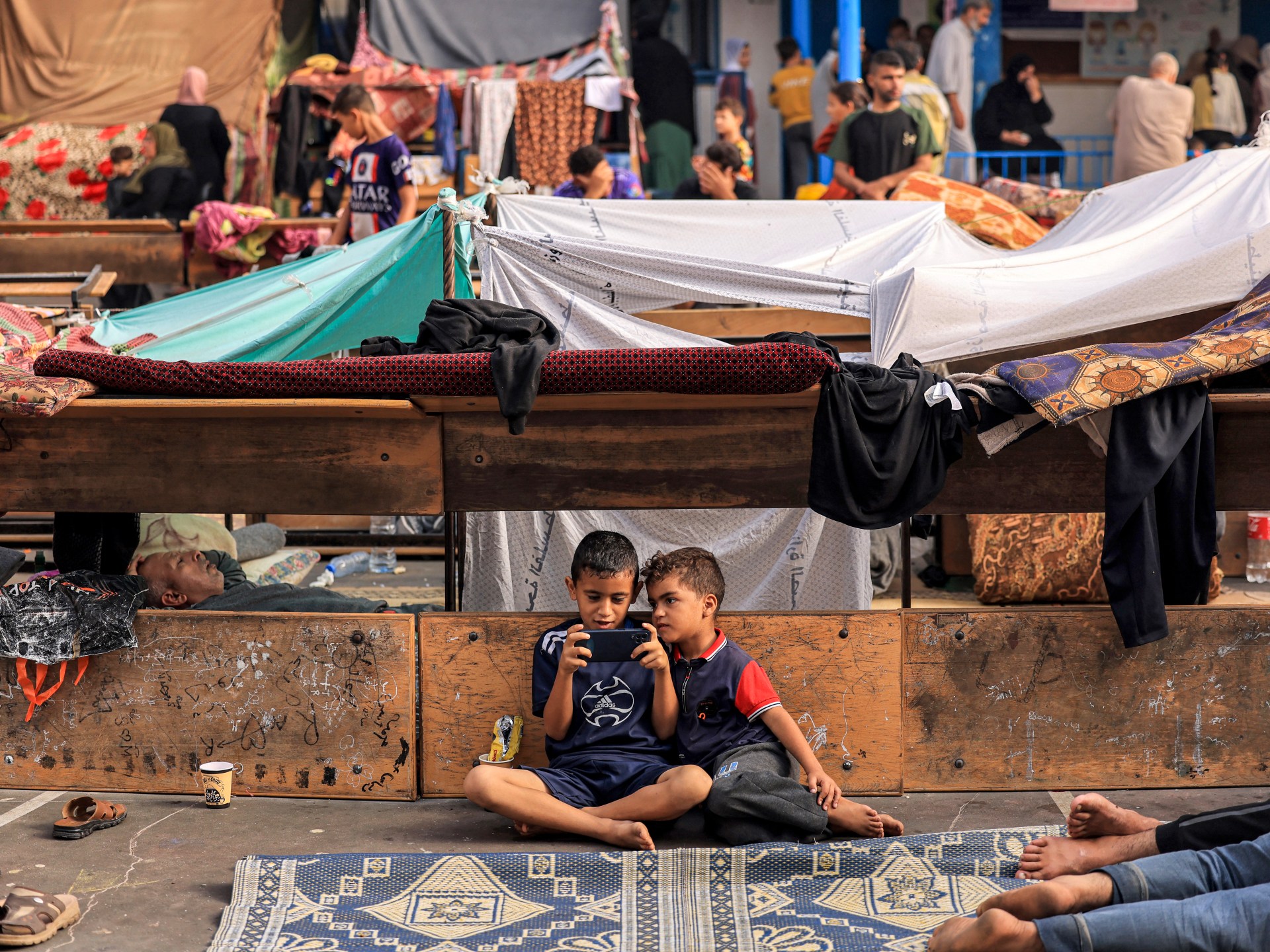 USAID Employees Support Ceasefire, Biden Urges Humanitarian Pause, Israeli Envoy Shares Hamas Footage, Biden Questions Hamas Hostages