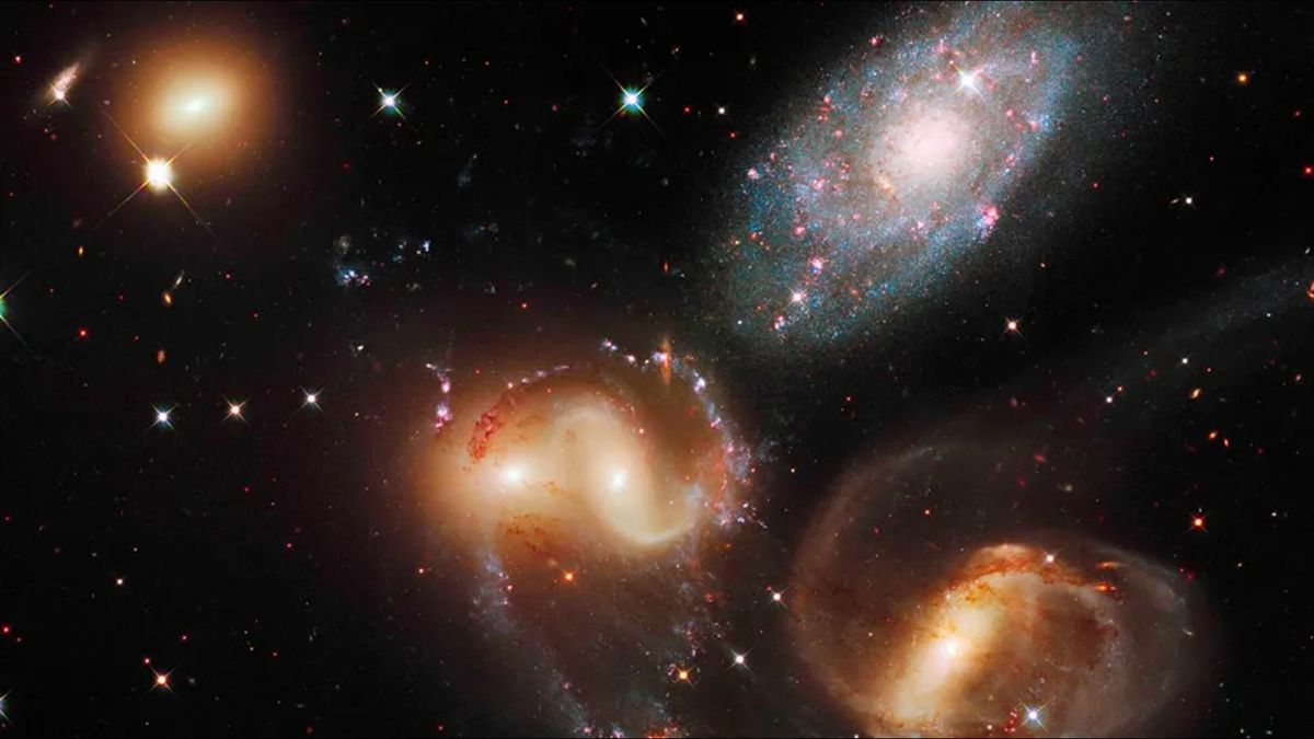 Featured image for Astronomers Capture 2 Million MPH Galactic Collision with Sonic Boom