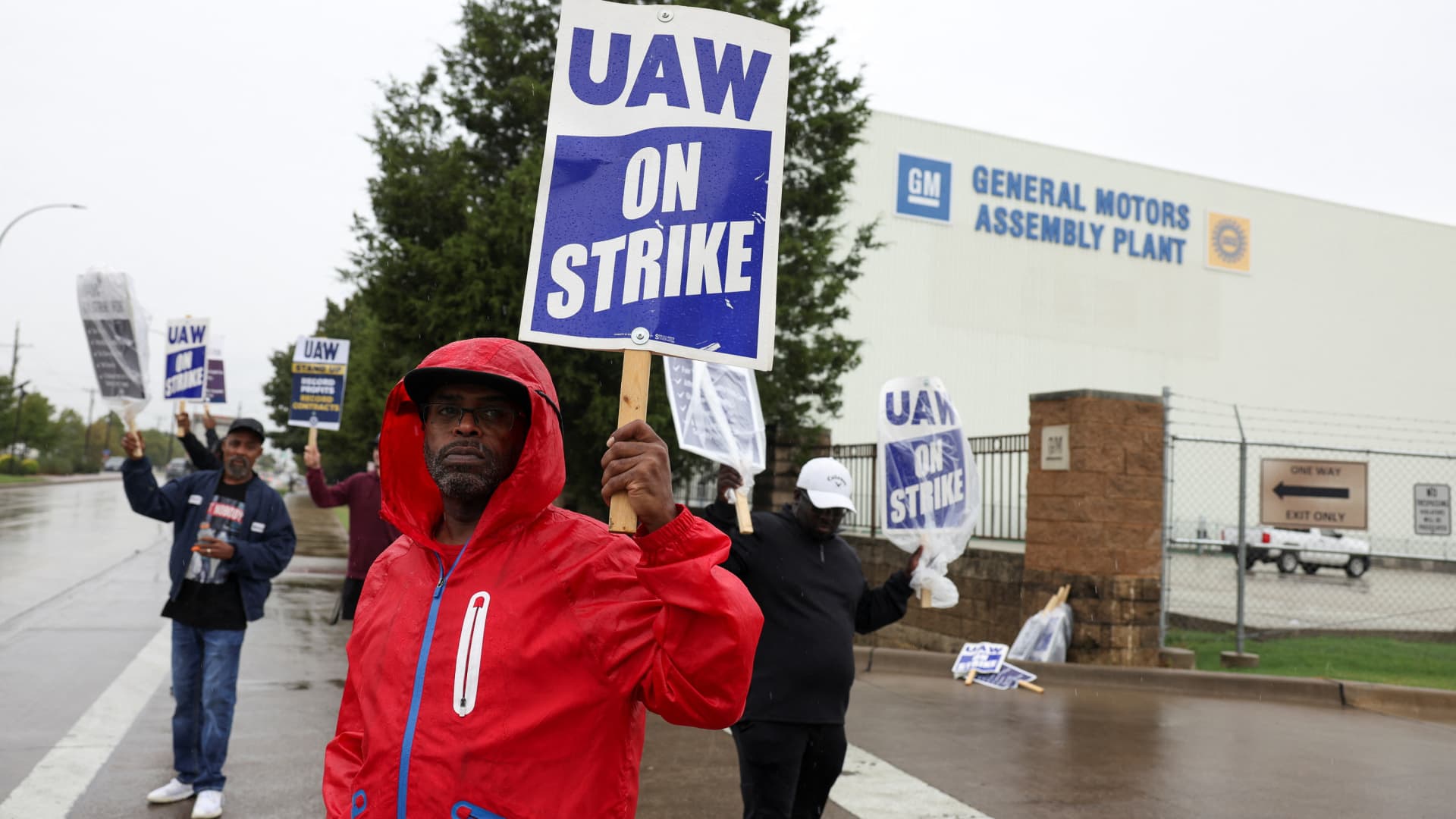 "UAW Strikes Deals with Stellantis and Ford, Securing Pay Gains for Union Workers"