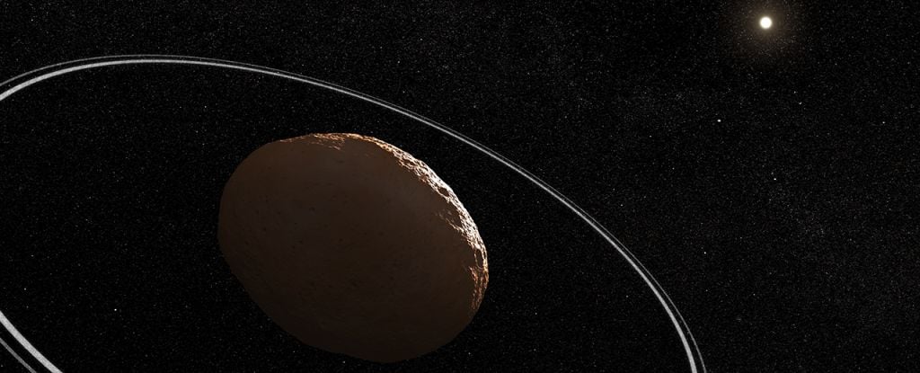 Featured image for "Unveiling the Enigmatic Influence of Hidden Moons on Space Rock Rings"