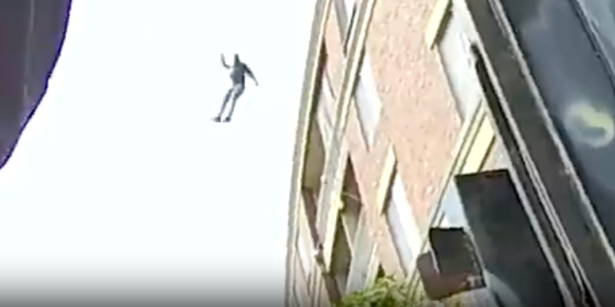 Dramatic Escape: Robbery Suspect's Jaw-Dropping Leap from Building Caught on Camera