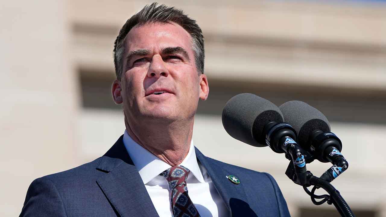 Featured image for Oklahoma Governor Stitt faces backlash for cutting PBS and OETA funding over LGBTQ content.