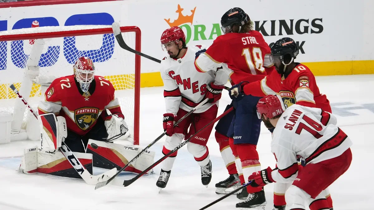 Panthers prevail over Hurricanes despite Barkov injury in NHL playoffs.