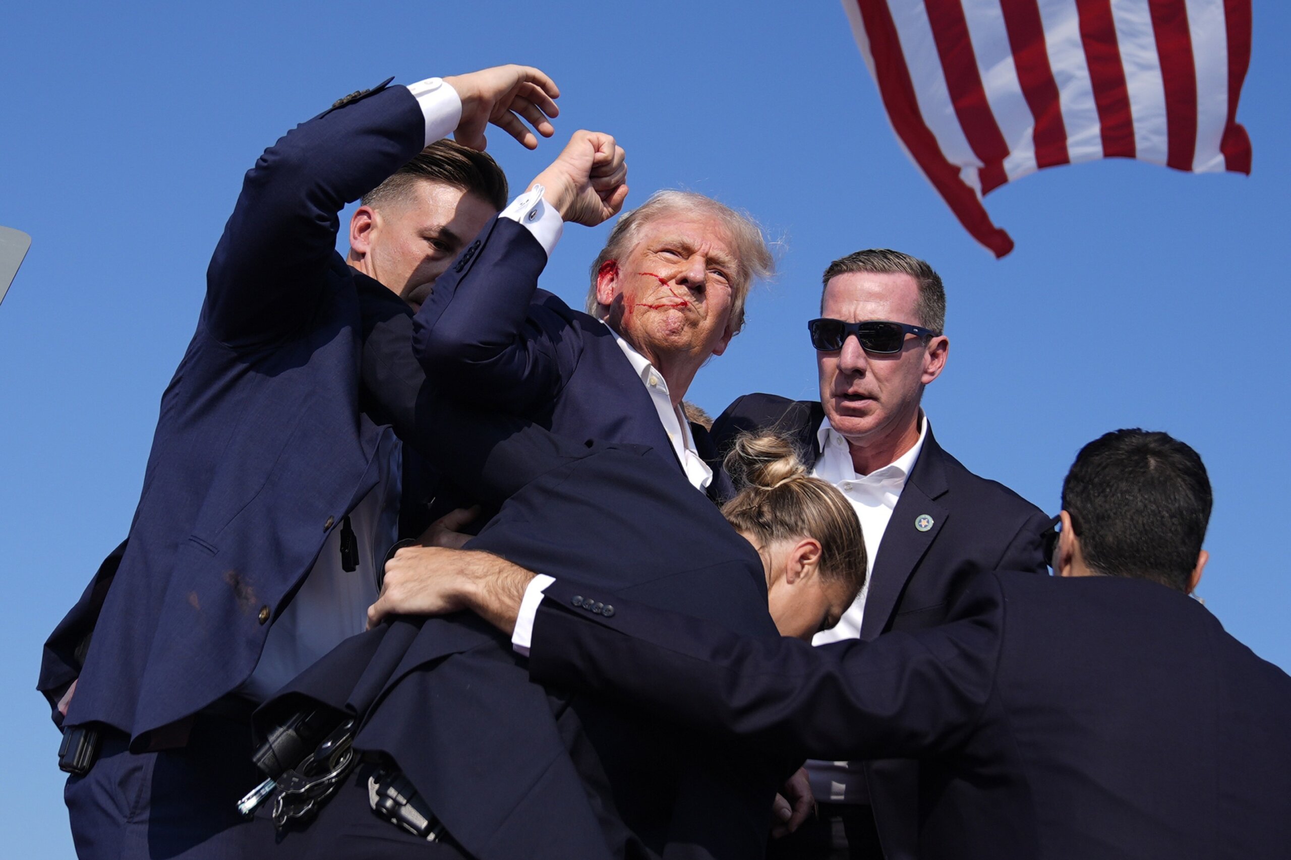 "Trump Attends Convention Amid Assassination Attempt Probe"