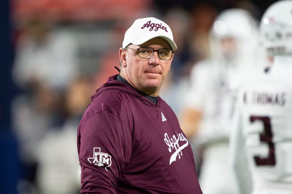 Featured image for Week 14 College Football: Rivalries, Predictions, and Playoff Implications