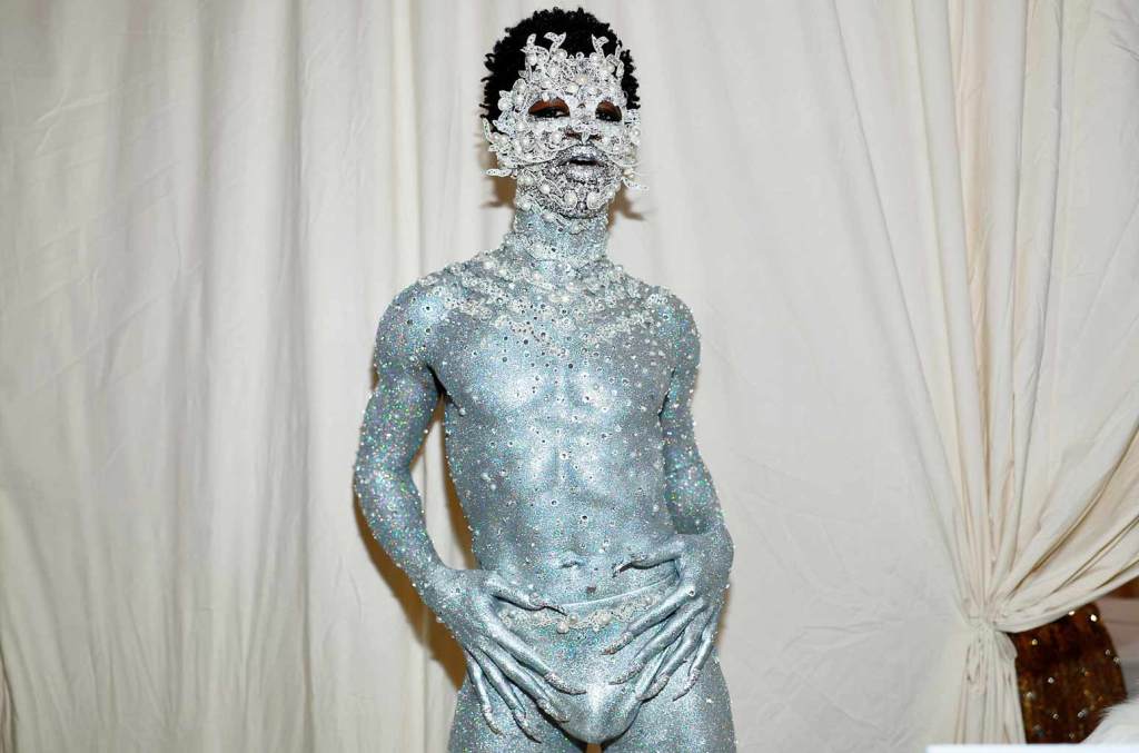 Lil Nas X Shines at Met Gala in Bejeweled and All-Silver Looks.
