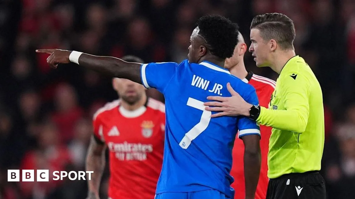 Real Madrid edge Benfica after 10-minute pause sparked by racist abuse allegation