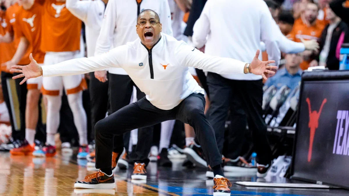 Rodney Terry named full-time head coach of Texas men's basketball team.
