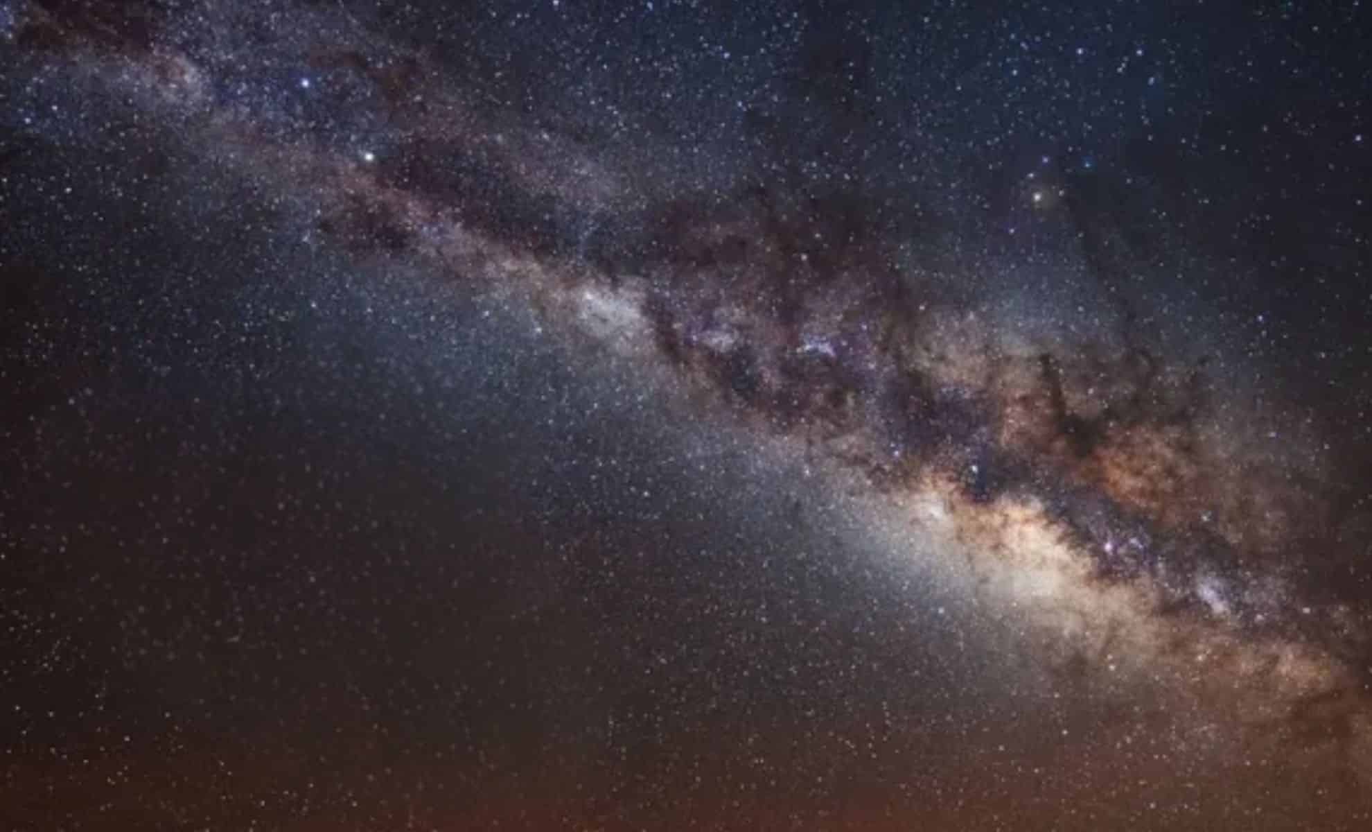 Featured image for Scientists Discover Rare Exoplanet in Milky Way's Outskirts Using Einstein's Space-Time Effect