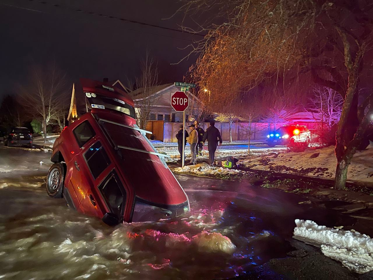 Vancouver Couple Survives SUV Swallowed by 12-Foot Sinkhole