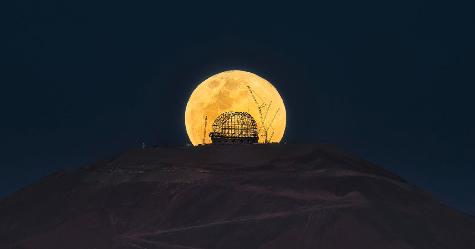 Featured image for Captivating Image: Full Hunter's Moon Illuminates World's Largest Telescope