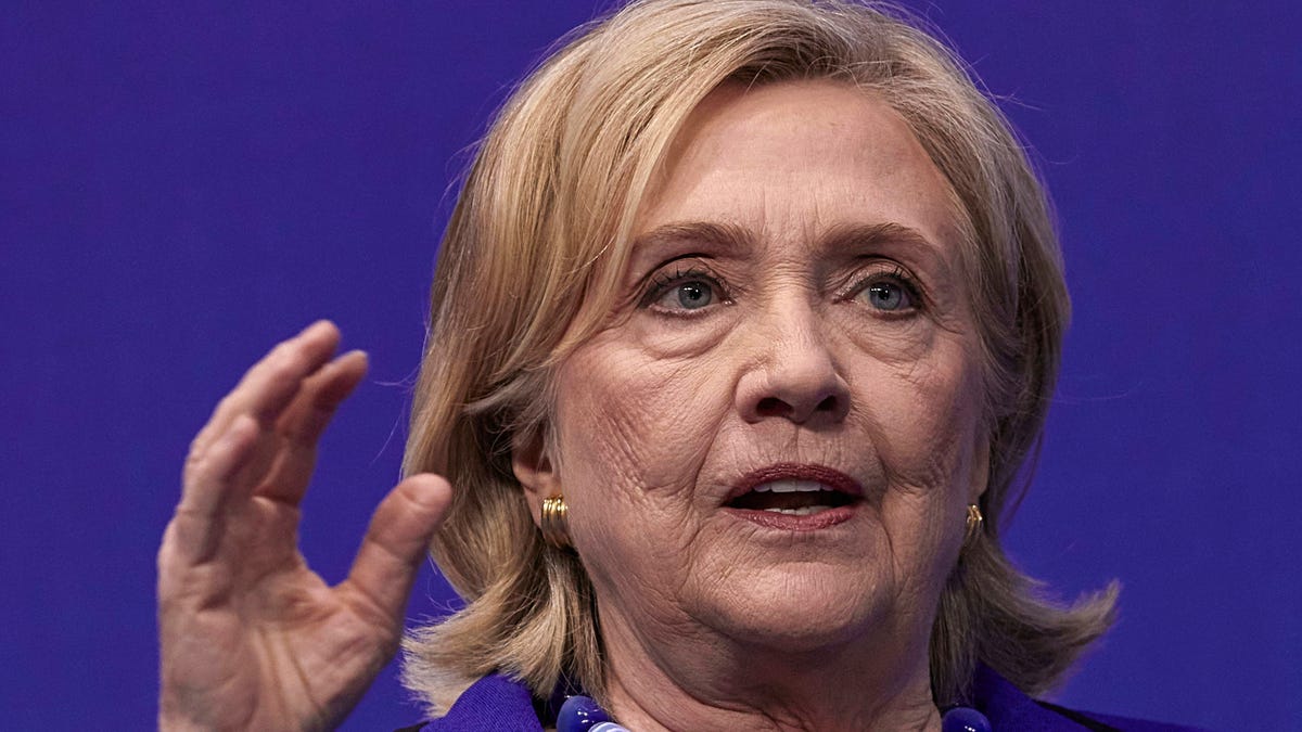 Featured image for Hillary Clinton Doubts Trump's Self-Pardon Comments and Warns of Russian Election Interference in 2024