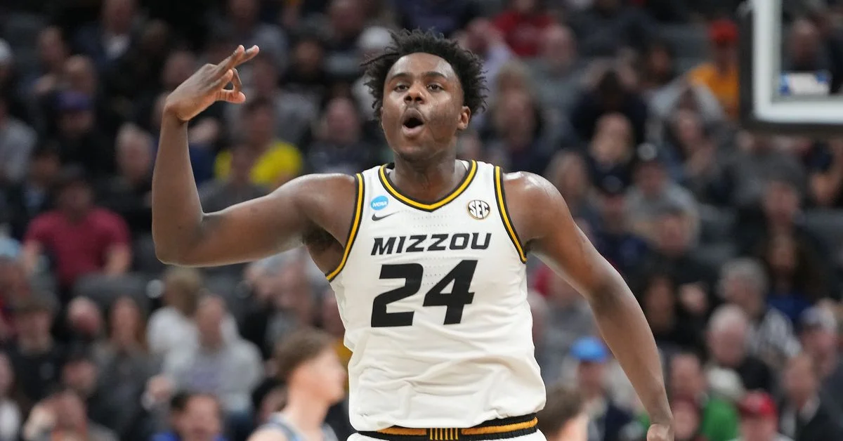 Missouri defeats Utah State to advance in NCAA Tournament.