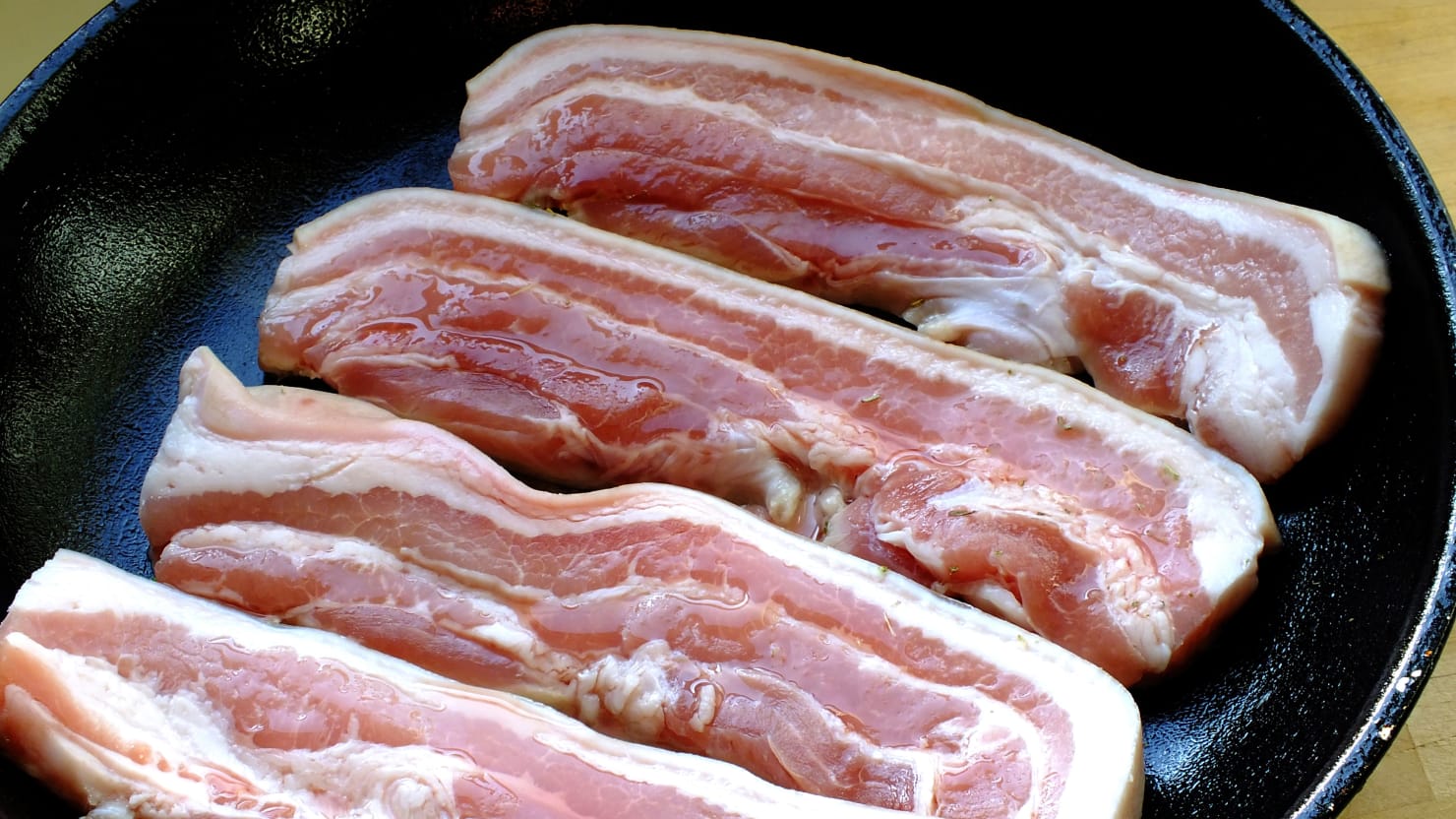 Featured image for "Undercooked Bacon Consumption Linked to Brain Tapeworm Infestation in Man"