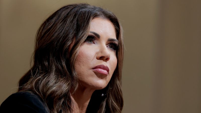 Featured image for Kristi Noem Claims Migrant Threatened Trump, Investigators Suspect Setup