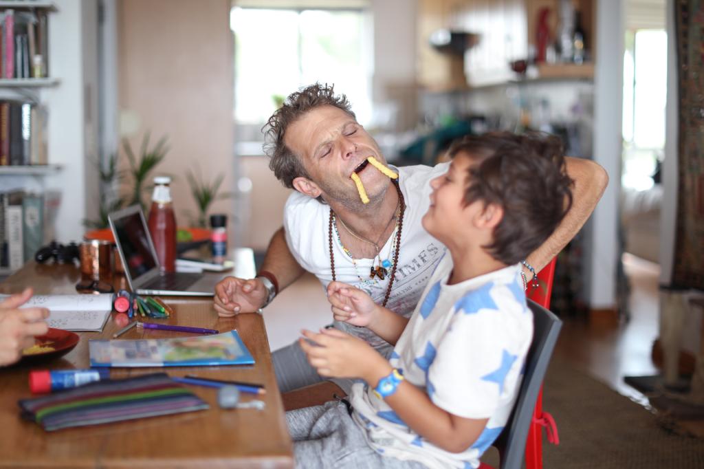 The Benefits of Dad Jokes in Parenting, According to Experts