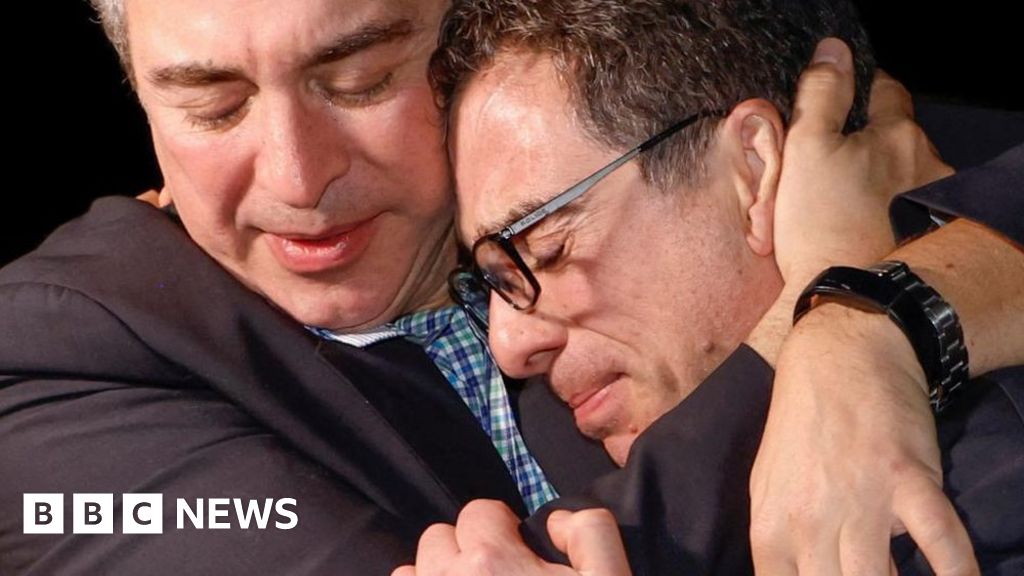 Featured image for Americans Released in Iran Prisoner Swap Return Home