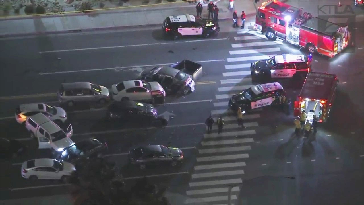 Police chase in Long Beach ends in fatal crash, leaving 1 dead and 8 injured.