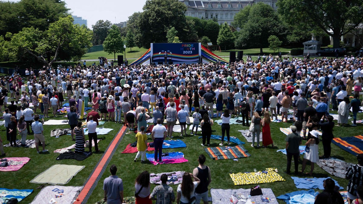 White House bans topless activist from future events.