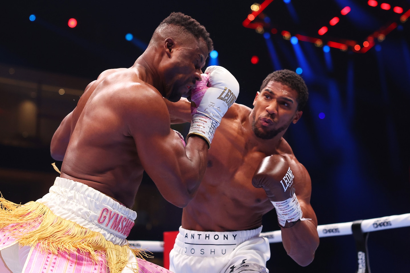 "Anthony Joshua Dominates Francis Ngannou with Second-Round Knockout Victory"