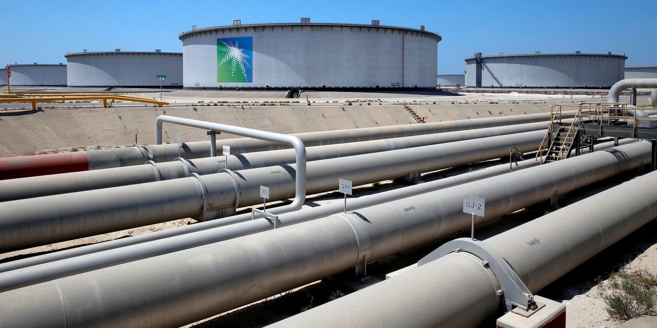 Biden's Green Energy Agenda Faces Challenges Amidst Soaring Oil Prices.