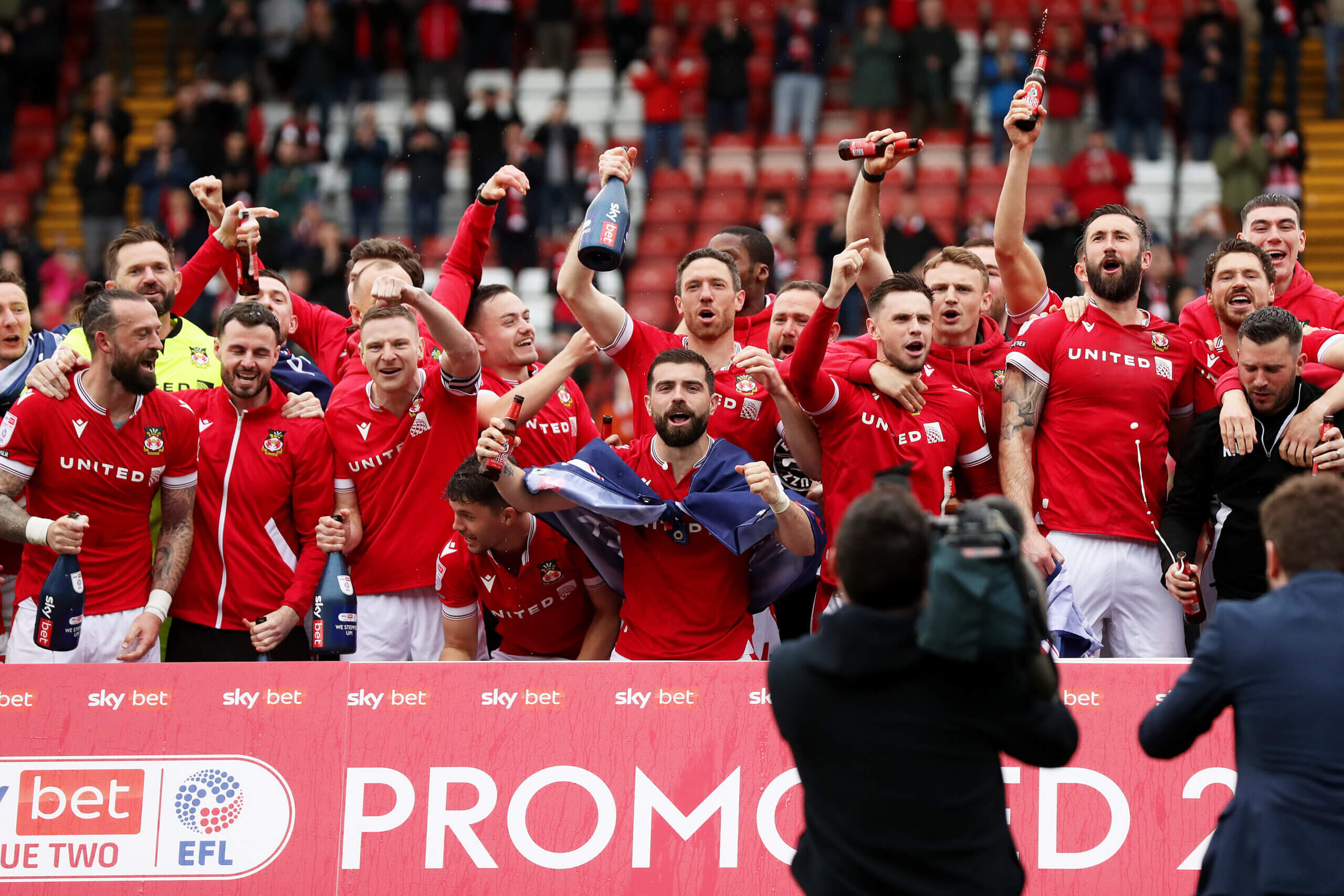 Featured image for "Wrexham's Historic Promotion to League One: A Magnificent Victory and What Comes Next"