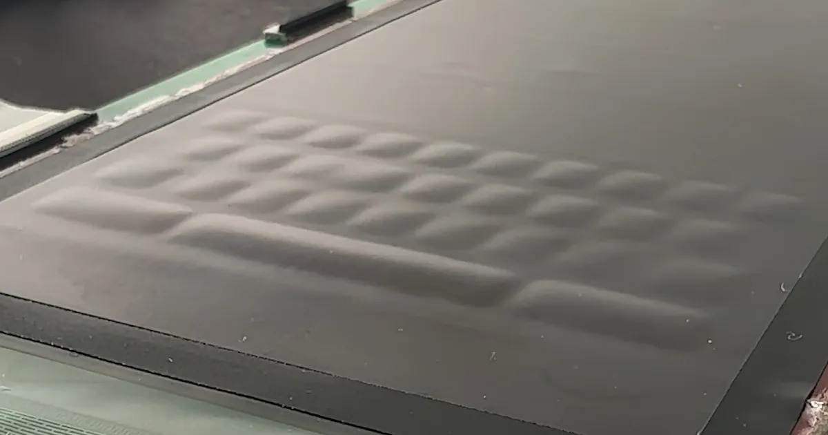 Featured image for "Revolutionary OLED Touchscreen with Liquid-Filled Tactile Buttons"