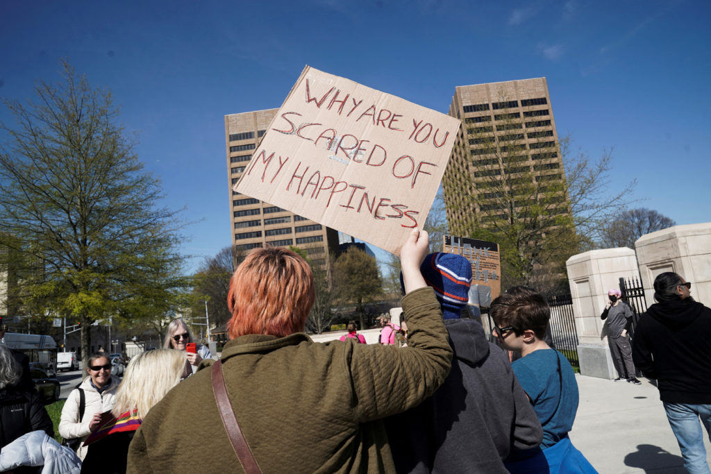 Kansas Gov. vetoes anti-trans bills ahead of potential overrides.