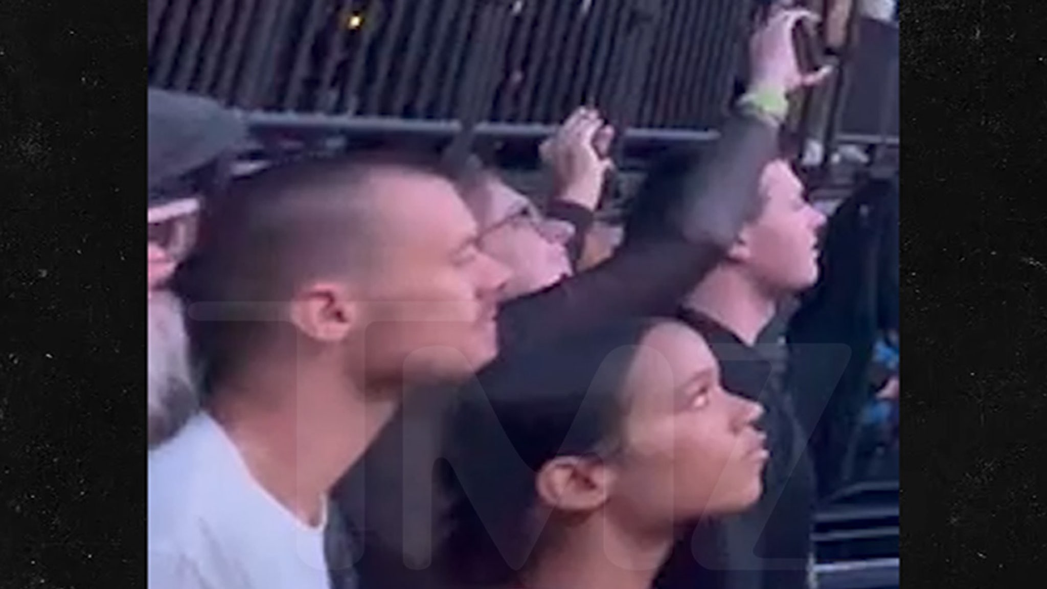 Featured image for Harry Styles Rocks New Bald Look at U2 Concert with Taylor Russell