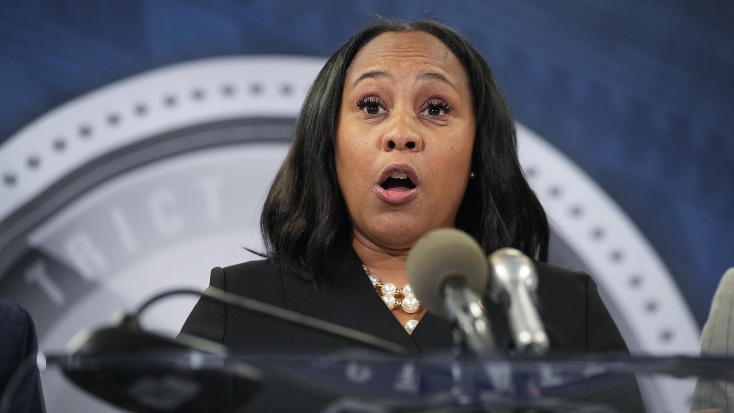 Featured image for "Fulton County DA Confirms Romantic Relationship with Prosecutor in Trump Case"