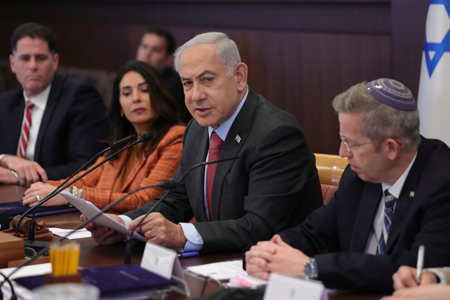 Israel's Netanyahu government backtracks on judicial overhaul plan.