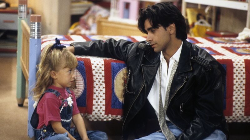 Featured image for John Stamos Admits to Getting Olsen Twins Fired from 'Full House'