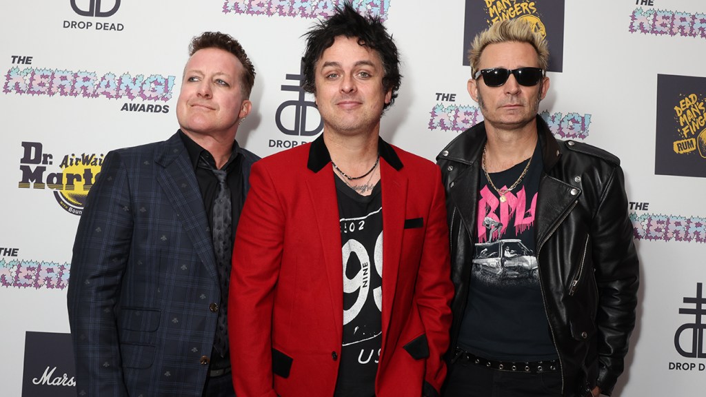 Featured image for "Green Day's Mike Dirnt Discusses 'American Idiot' Controversy and Activist Protest Music in 2024"