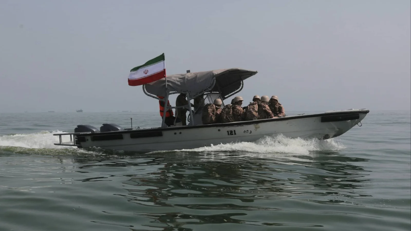 Three vessels struck by projectiles near Strait of Hormuz as tensions flare