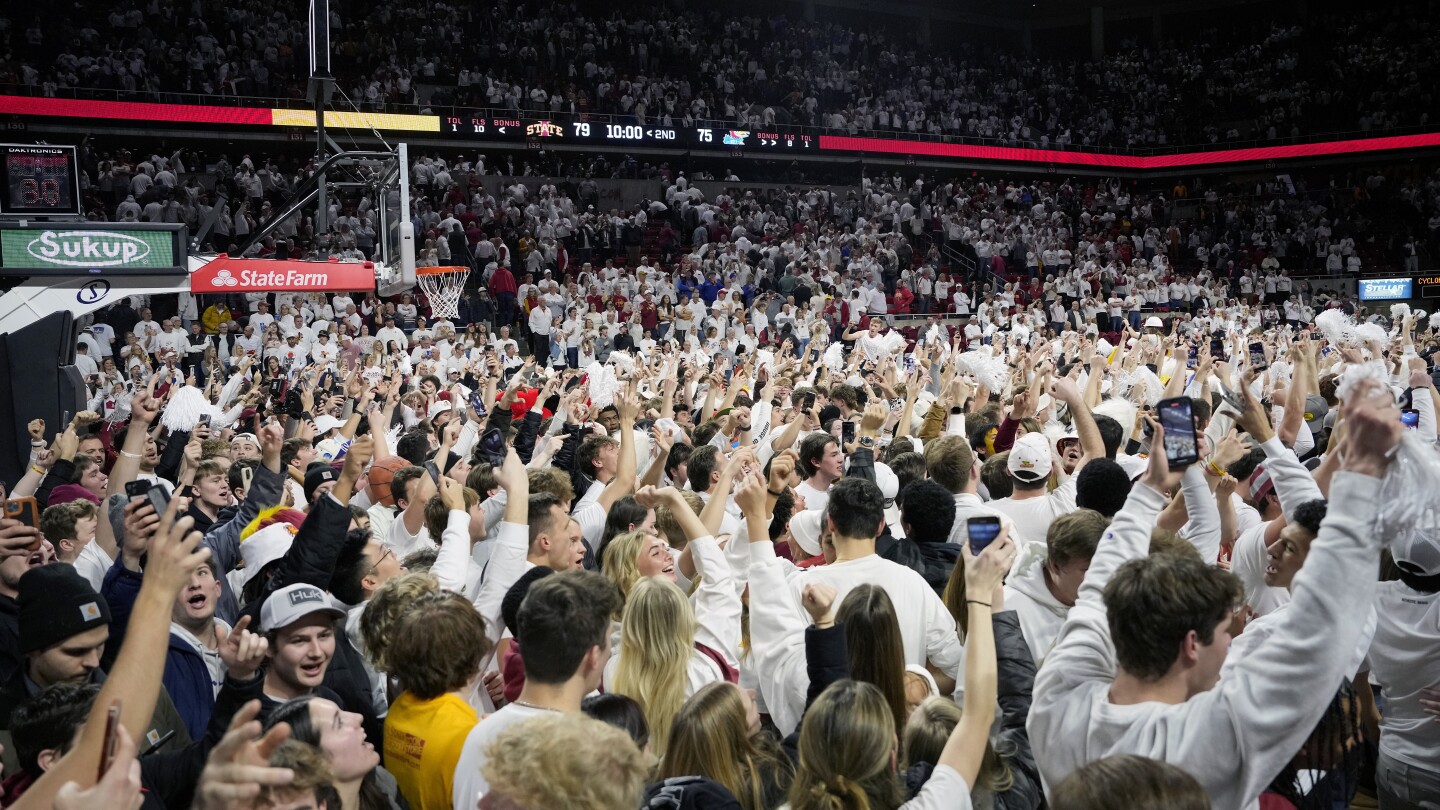 Featured image for "Court Storming Controversy: Caitlin Clark Incident Sparks Debate on Fan Behavior in College Basketball"