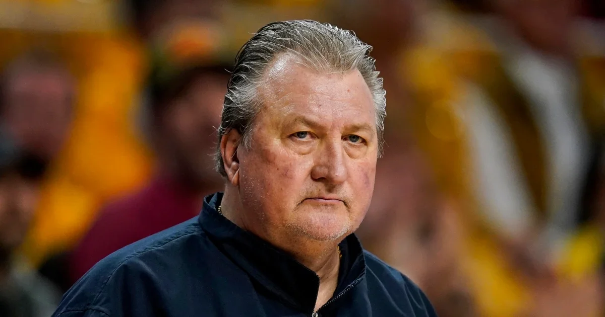 Bob Huggins accepts $1M pay cut and suspension for homophobic slur.