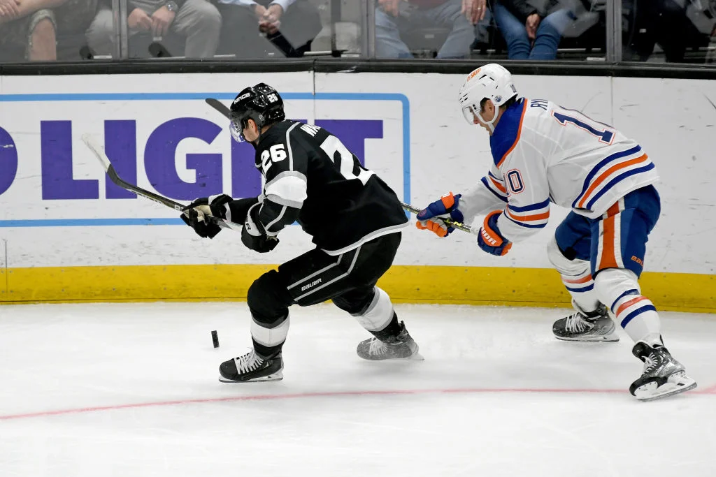 Oilers defeat Kings in NHL matchup.