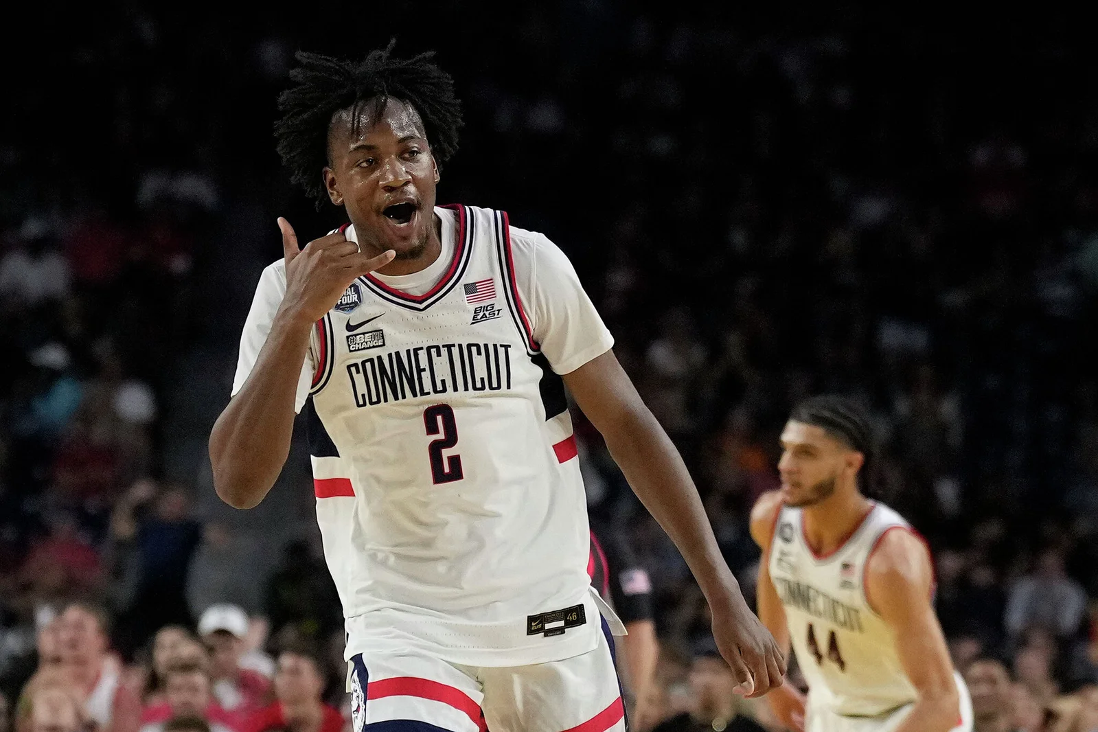 Tristen Newton chooses UConn over NBA for final season.